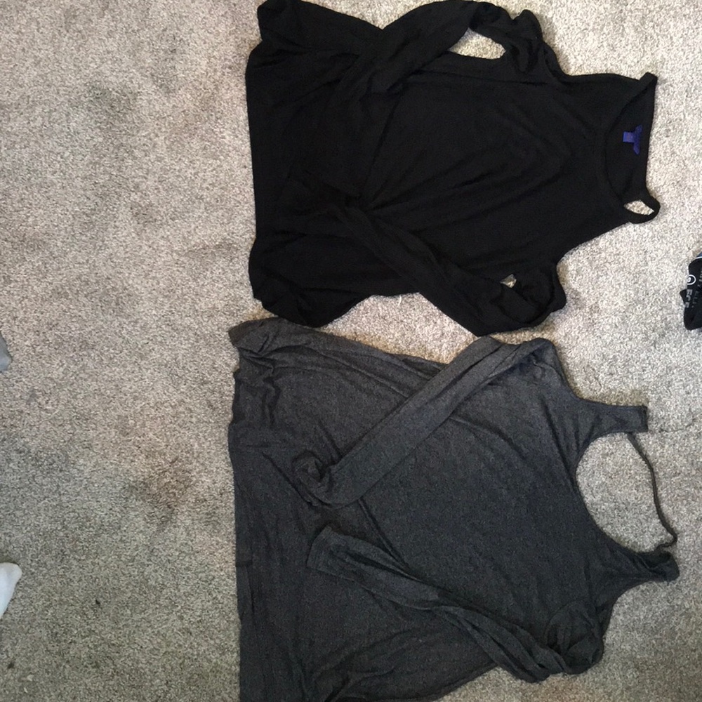 two long sleeve shirts with the shoulders cut out